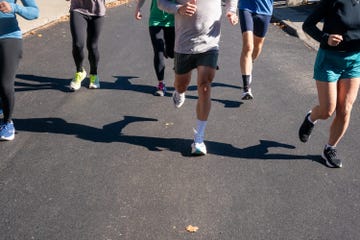 group running together on road