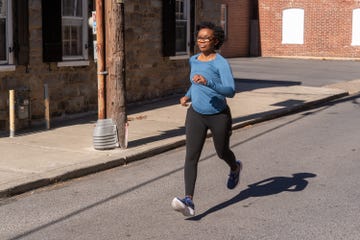 person jogging on a street