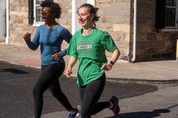 two runners on a road