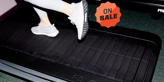 a person running on a peloton tread treadmill