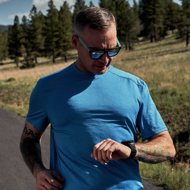 Runner looking at his watch, Arizona, 2019