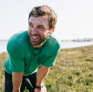 Runner Knelt Over & Resting with Dirt on His Face Runner Knelt Over & Resting with Dirt on His Face