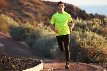 runner on sandy road in dry environment