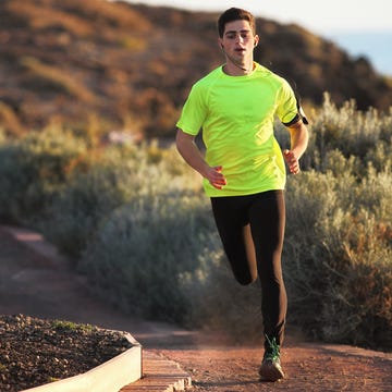 Runner on sandy road in dry environment runner on sandy road in dry environment