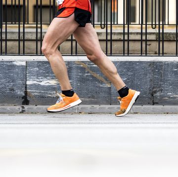 runner running fast in a career marathon for the city