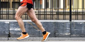 runner running fast in a career marathon for the city