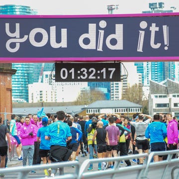Runners are seen crossing the finishing line during The... runners are seen crossing the finishing line during the