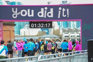 runners are seen crossing the finishing line during the