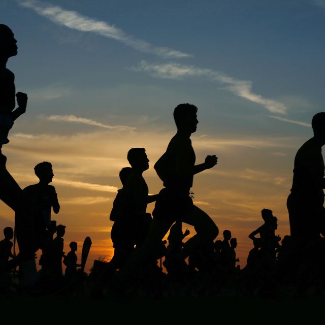 runners compete in a 5k at sunset in corona, california.