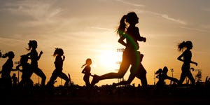 Runners compete in a 5k at sunset in Corona, California.