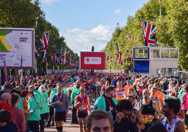 runners gather at the finish area in the mall during the