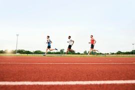 runners training on running track