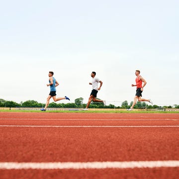 runners training on running biker track