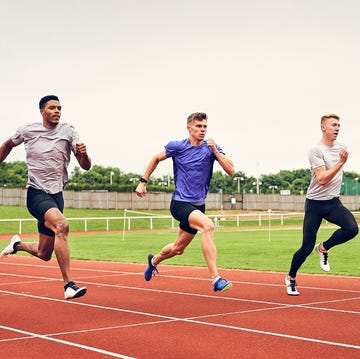 Runners training on running track runners training on running track
