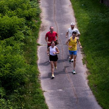 a overhead view of people Fsor running on a path