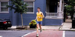 strong runner running across the street