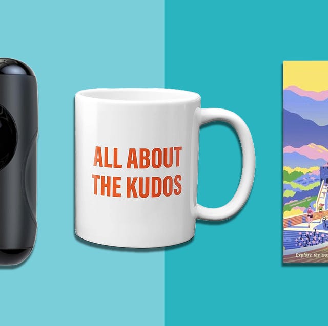 massage tool coffee mug and travel guide on a turquoise background massage tool coffee mug and travel guide on a turquoise background