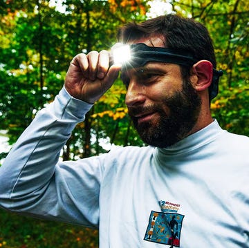 person outdoors signaling with their hand wearing a longsleeve shirt person outdoors signaling with their hand wearing a longsleeve shirt