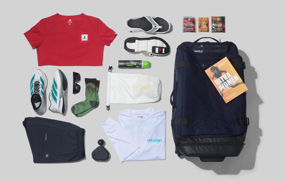 a selection of running kit laid out in a flatlay style a selection of running kit laid out in a flatlay style