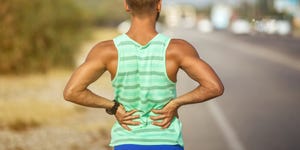 man runner lower back pain injury