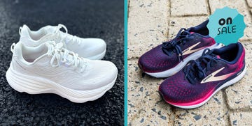 comparison of two pairs of running shoes one white and one in dark colors with a sale label