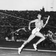 wilma rudolph crossing the finish line in relay