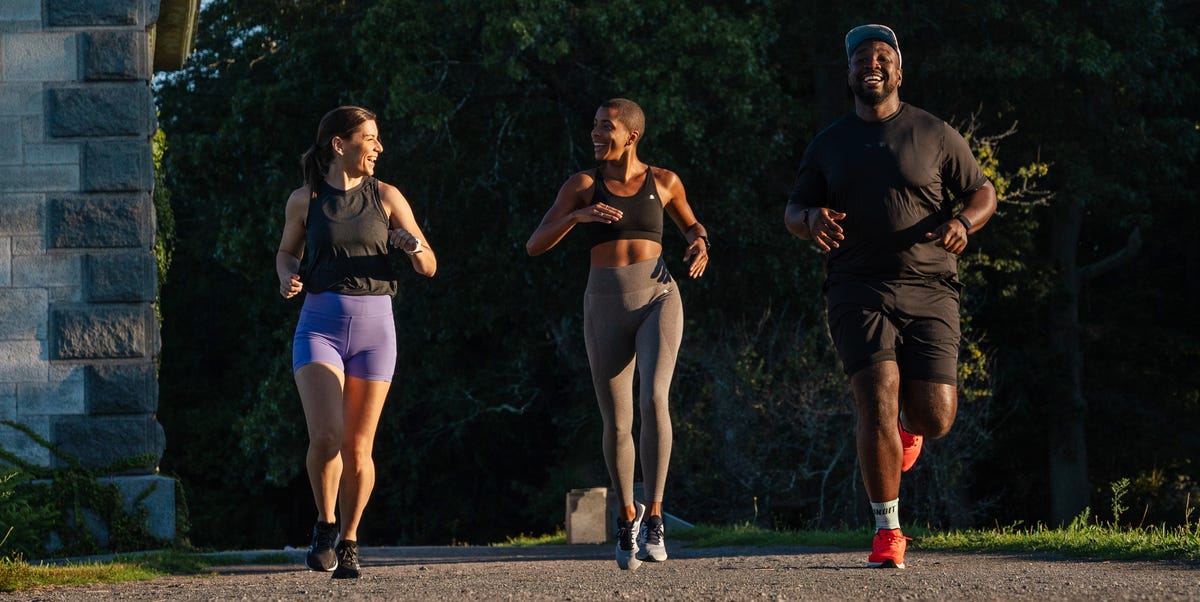 three runners on gravel path three runners on gravel path