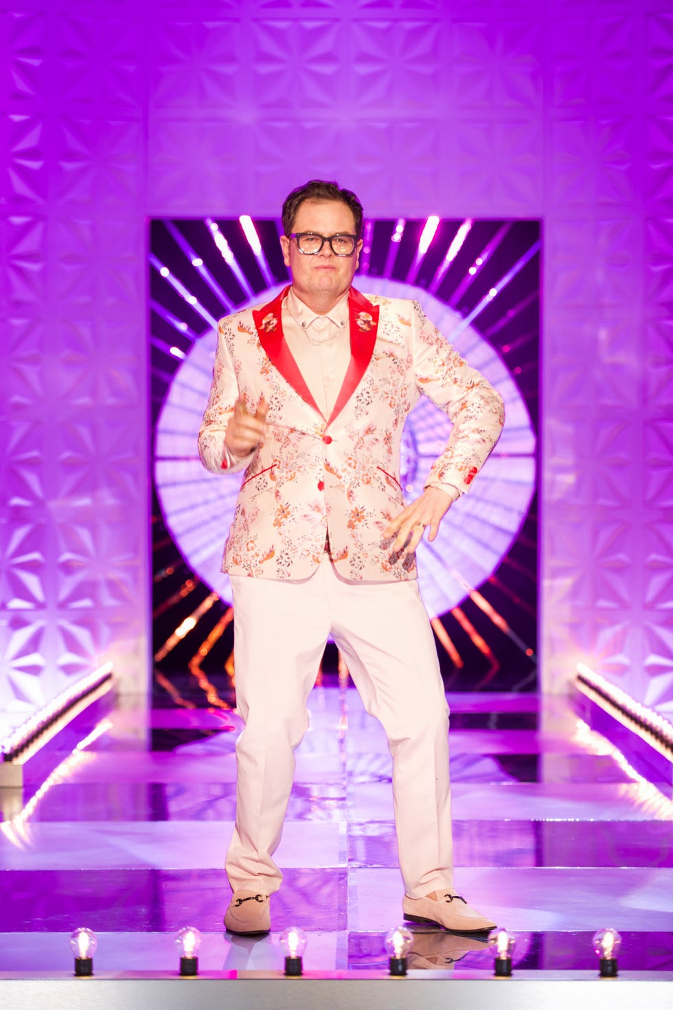 Alan Carr and husband Paul have split after 13 years together