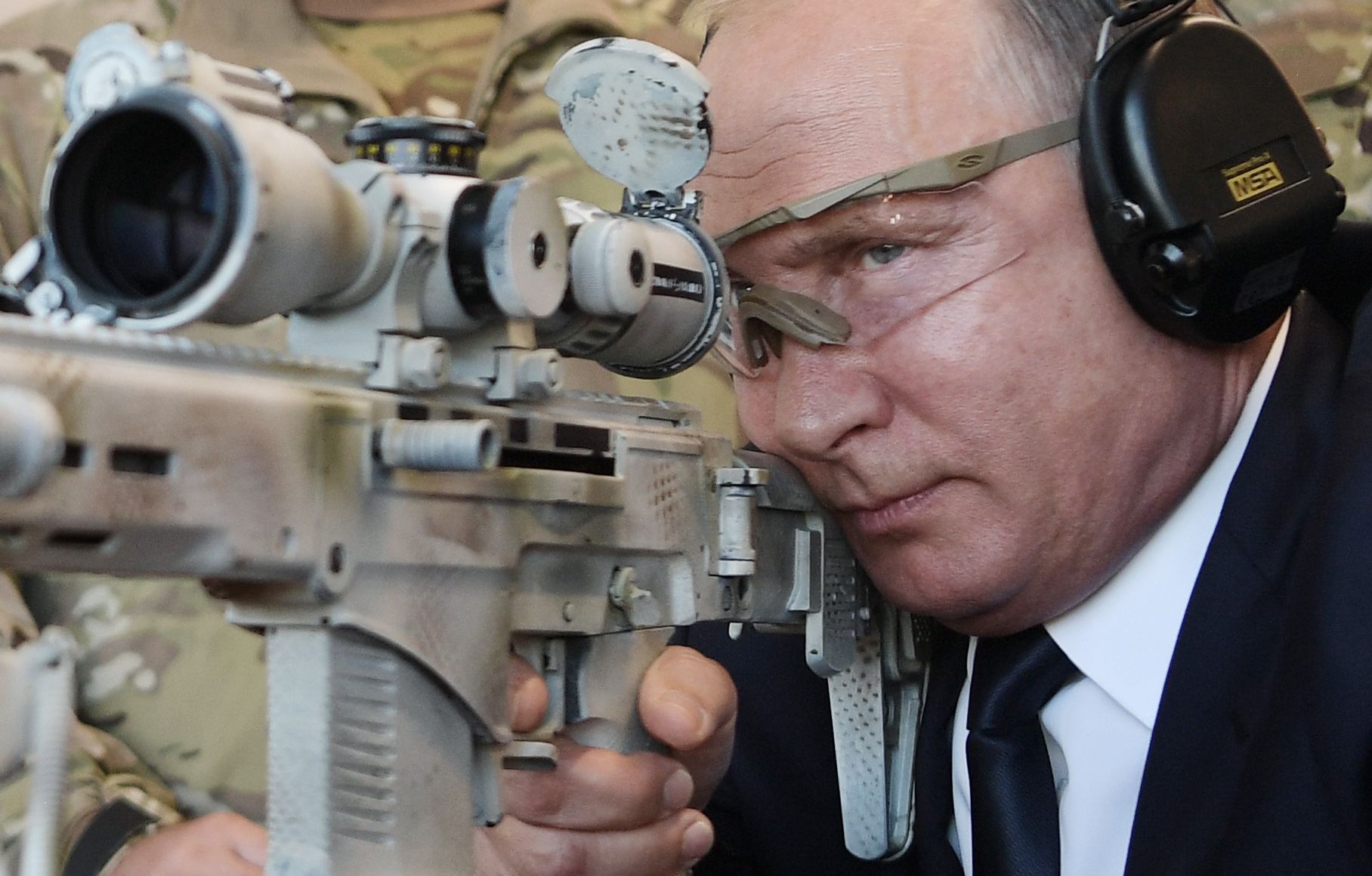 russian-president-vladimir-putin-looks-through-the-scope-as-news-photo-1036297074-1544130334.jpg