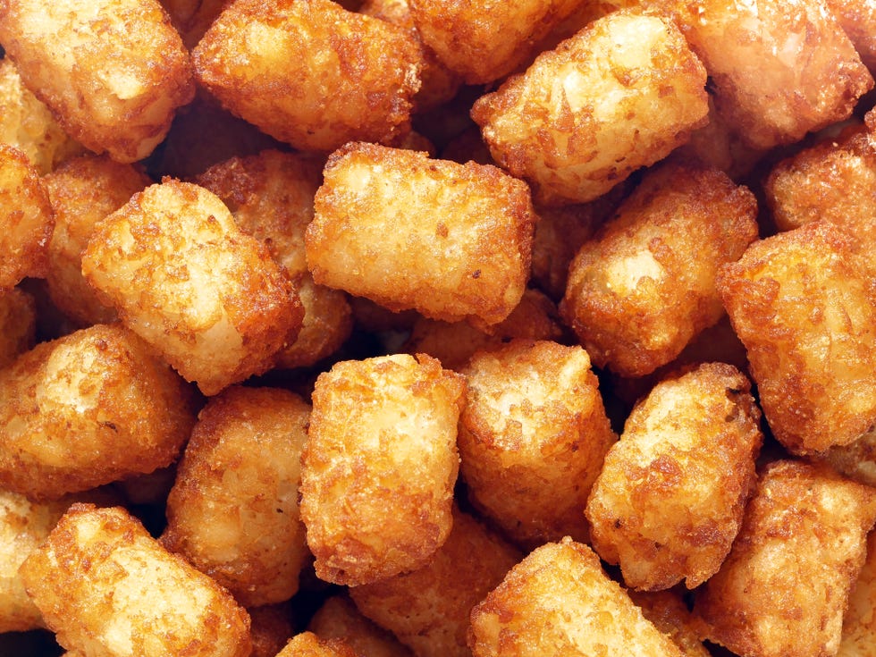 rustic golden potato tater tots food background