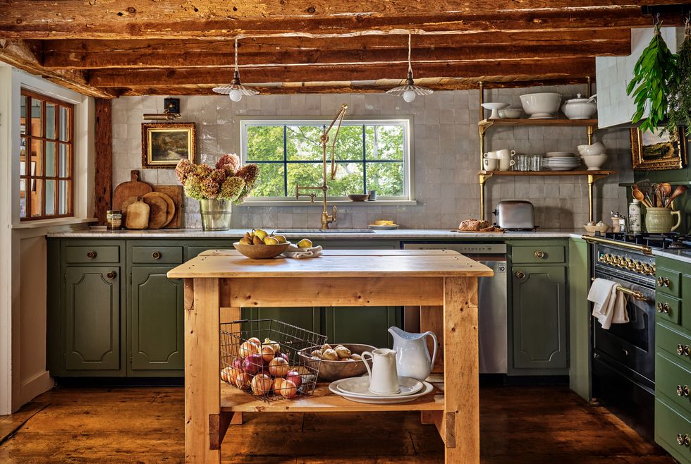 rustic kitchen with green cabinetry