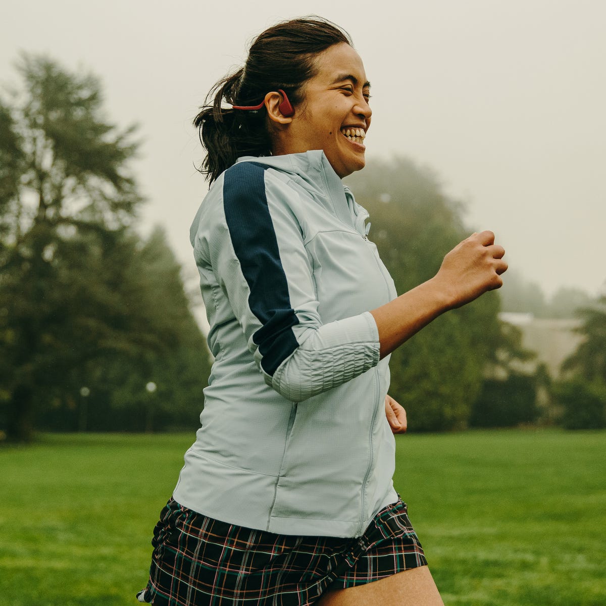 smiling woman running