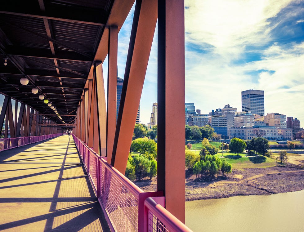 Metropolitan area, Architecture, Bridge, Urban area, Daytime, Sky, Reflection, Overpass, Building, City, 