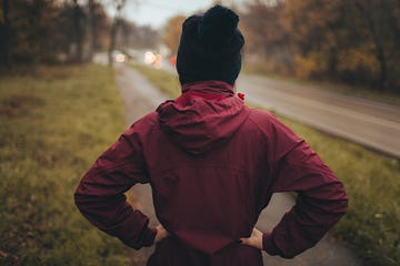 young woman having a rest after intense workout