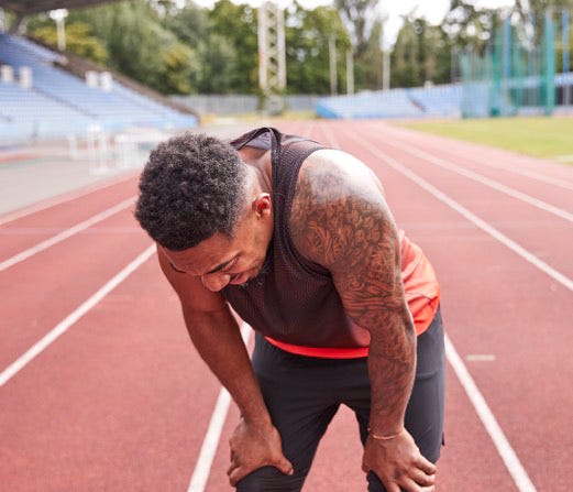 Sport venue, Shoe, Elbow, Knee, Sports, Individual sports, Muscle, Track and field athletics, Sneakers, Race track, 