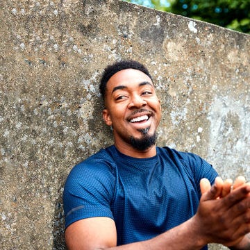 Facial expression, Blue, Smile, Cool, Wall, Facial hair, Arm, Beard, Finger, Photography, 