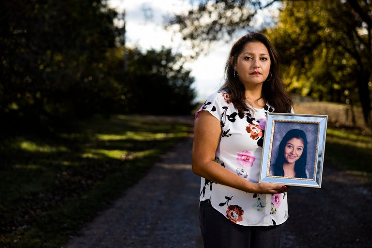 ericka martinez, mother of yuridia martinez, poses for photographs on the road outside her home nov 4, 2021 in rural norman, oklahoma