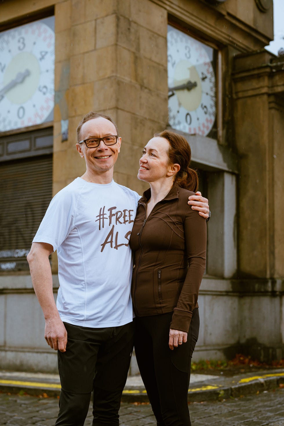a man and a woman stand next to each other