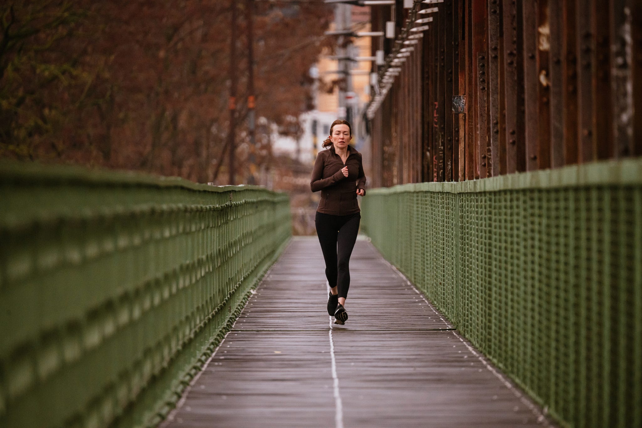 a head on shot of a woman running