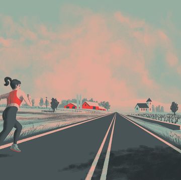 woman running in on a rural road