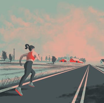 woman running in on a rural road woman running in on a rural road