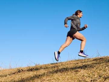 coach jess running up a hill