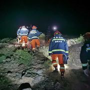 rescuers search