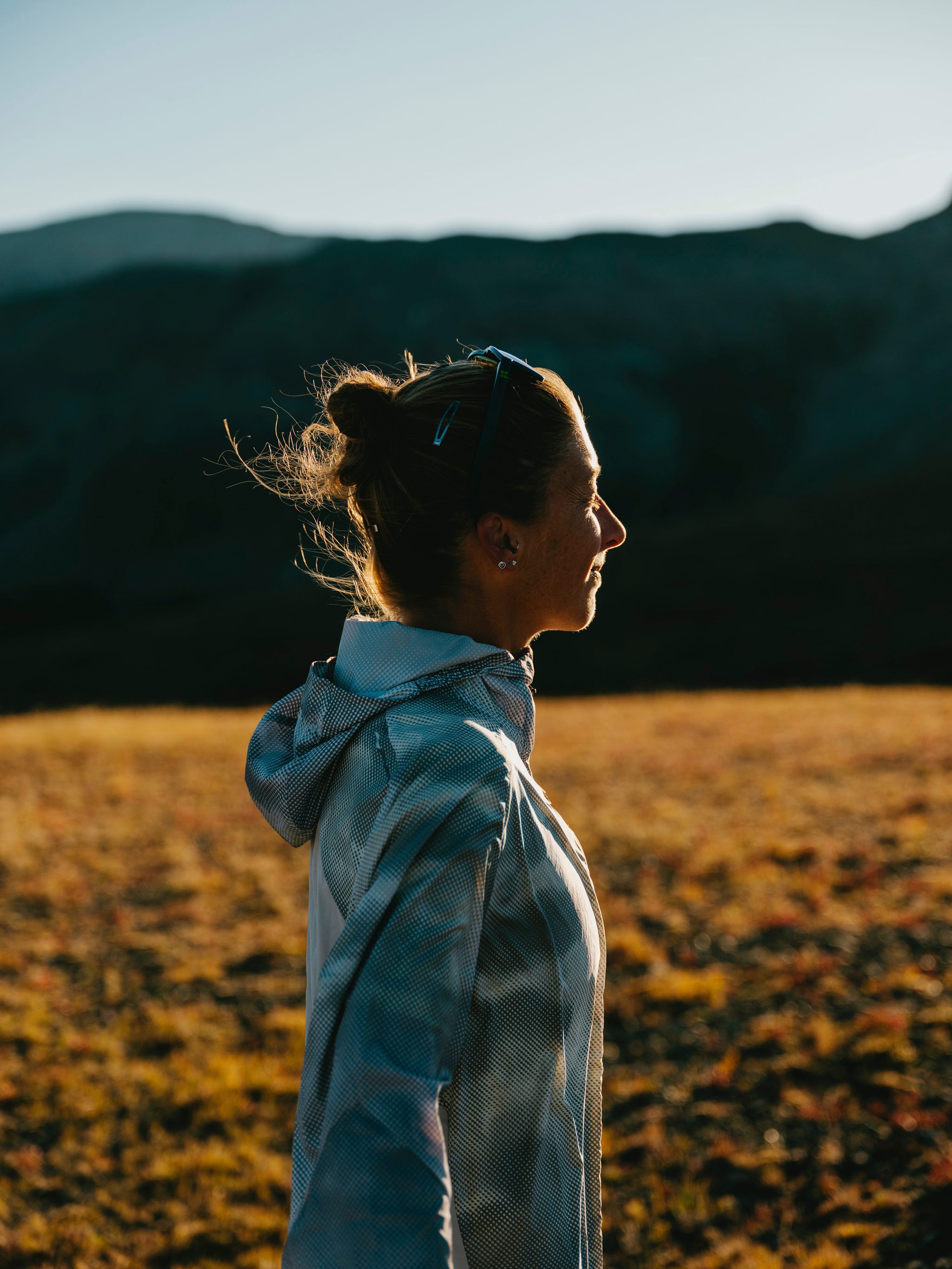 a runner on a mountainous trail