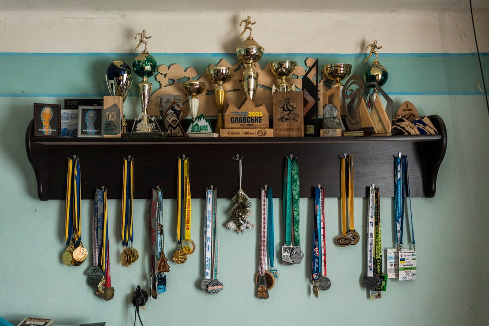 a group of trophies and medals on a wall