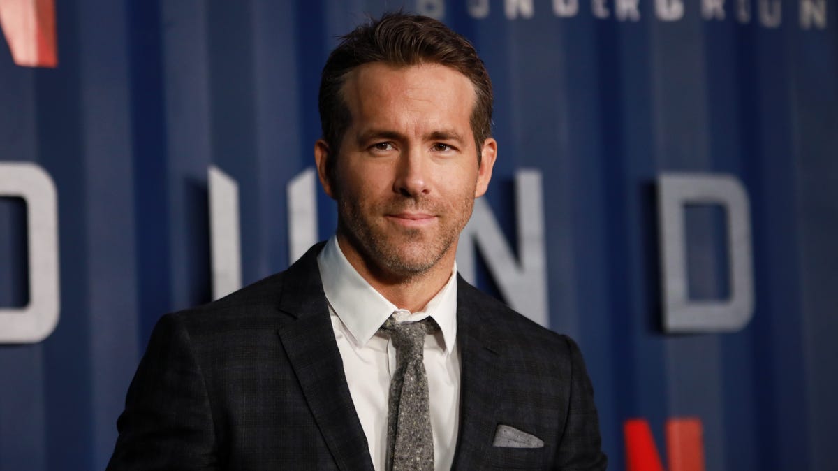 Ryan Reynolds Swears He Has No Memory of Holding Up Novelty T