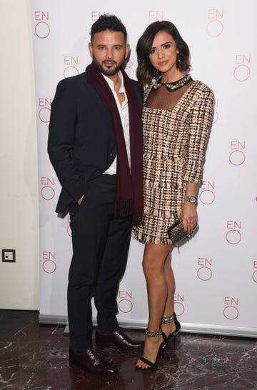ex coronation street actor ryan thomas poses with his partner lucy mecklenburgh in front of white background