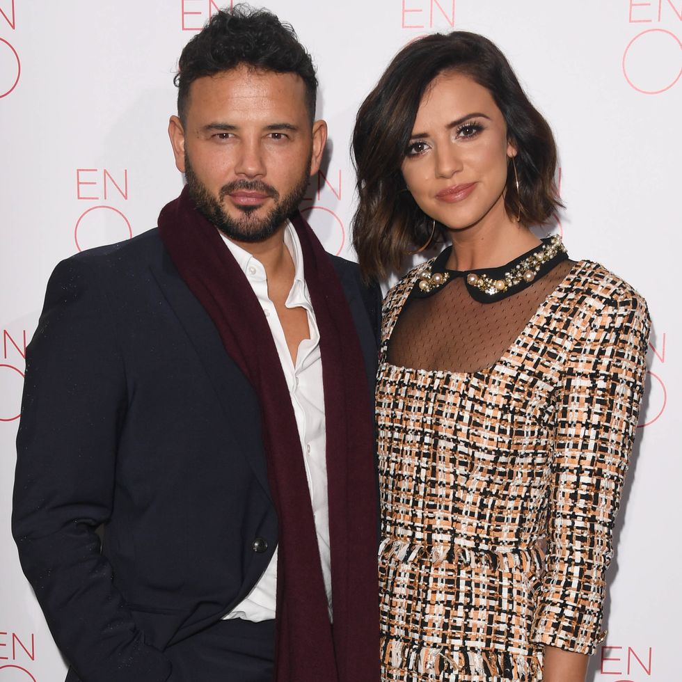 ex coronation street actor ryan thomas poses with his partner lucy mecklenburgh in front of white background