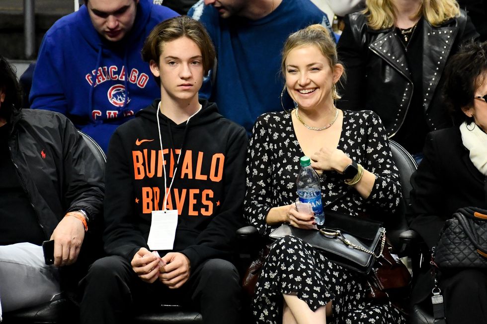 los angeles, california   november 07 kate hudson and her son ryder robinson attend a basketball game between the los angeles clippers and the portland trail blazers at staples center on november 07, 2019 in los angeles, california photo by allen berezovskygetty images