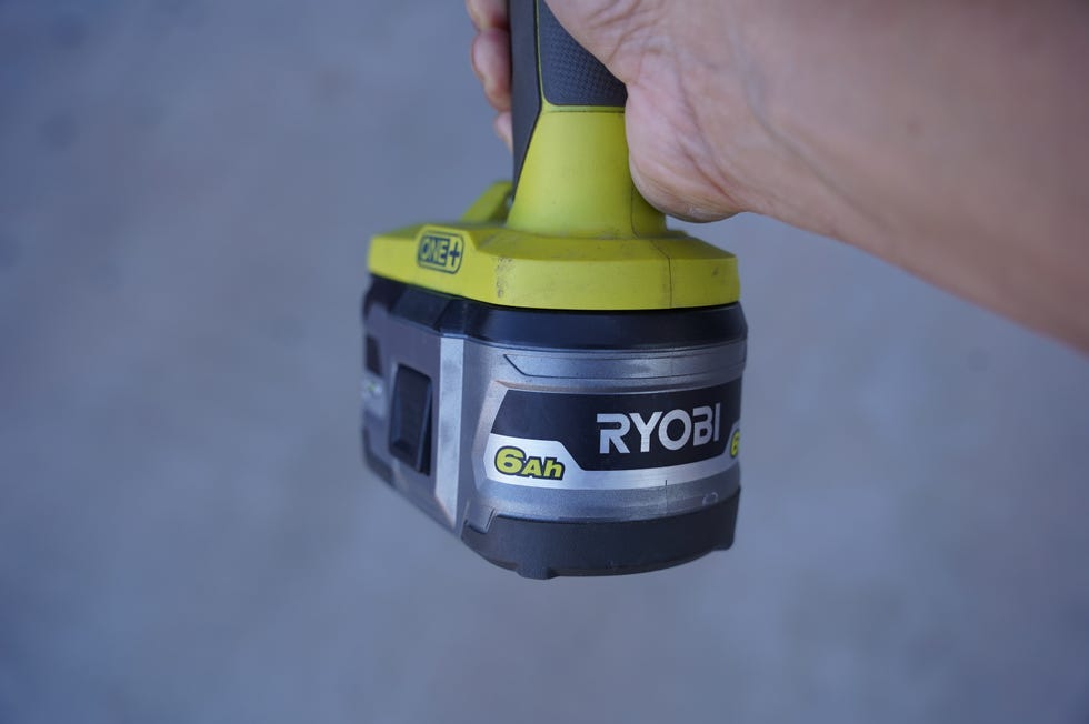 ryobi 6ah battery held in hand
